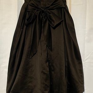 Black high waisted satin skirt with bow